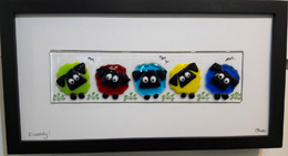 'Diversity' Fused Glass Framed size 44cms x 23 cm One of a series of quirky sheep images